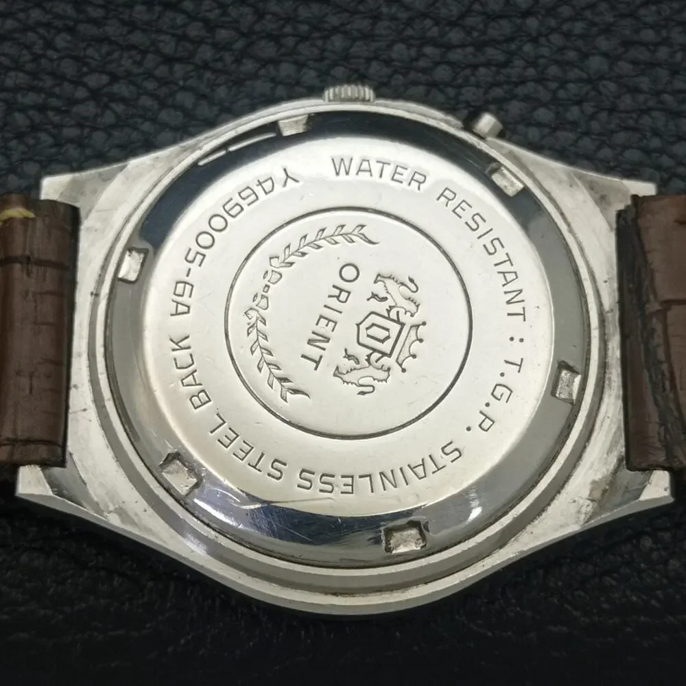 Vintage 1986 Orient Automatic Mens Silver Watch W/daydate & Gold accents